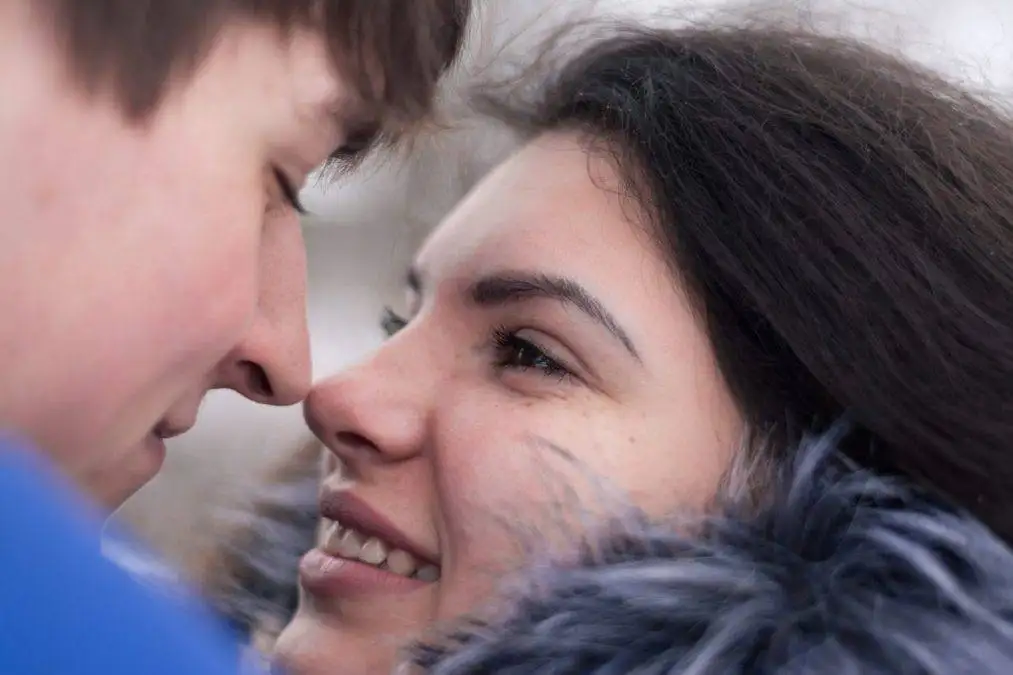 Couple smiling at each other