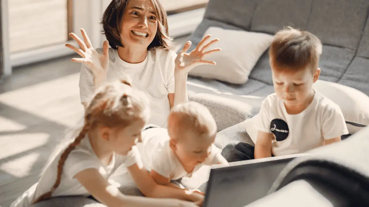 Mother sitting with her children