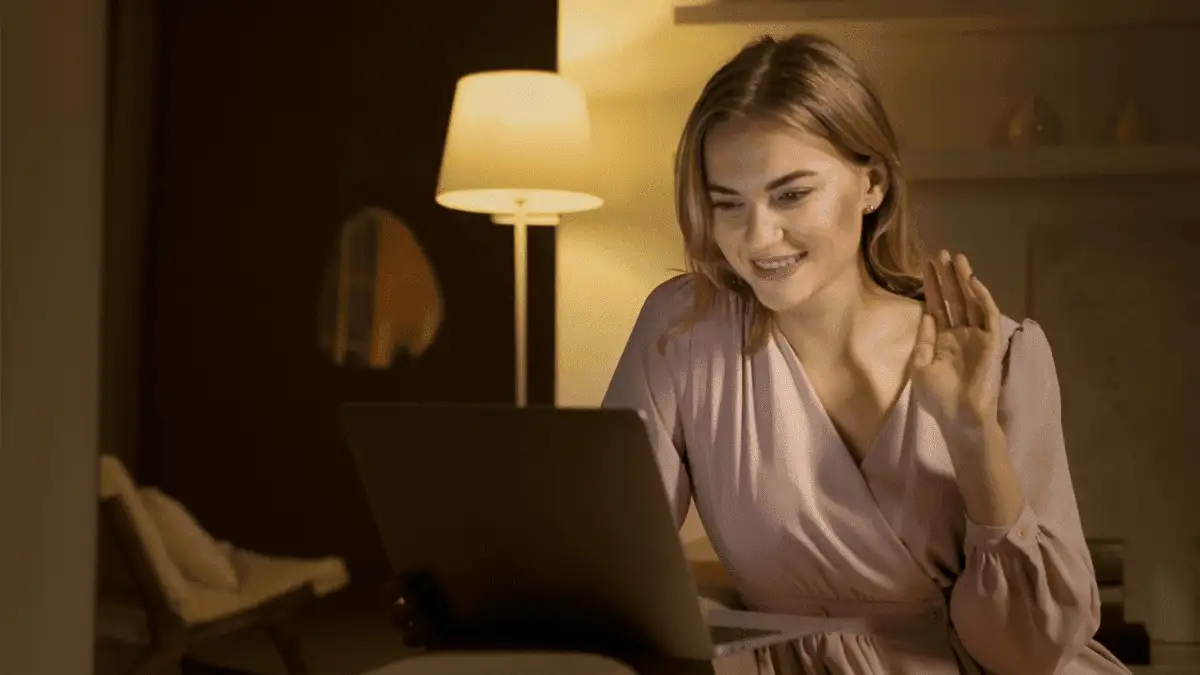 A girl chatting with a guy using her laptop