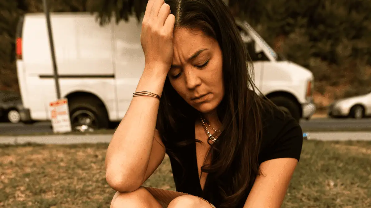 A worried woman thinking