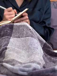 A woman journaling for worrying