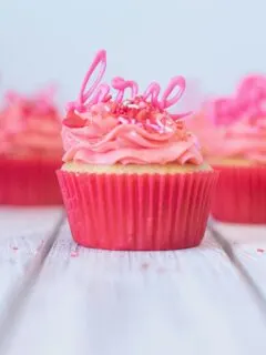 pink cupcake with pink icing on top