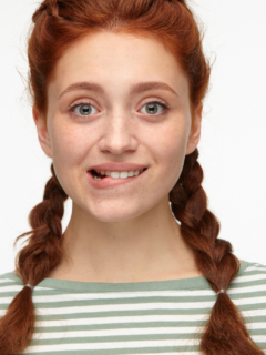 What Does It Mean When a Girl Bites Her Lip?